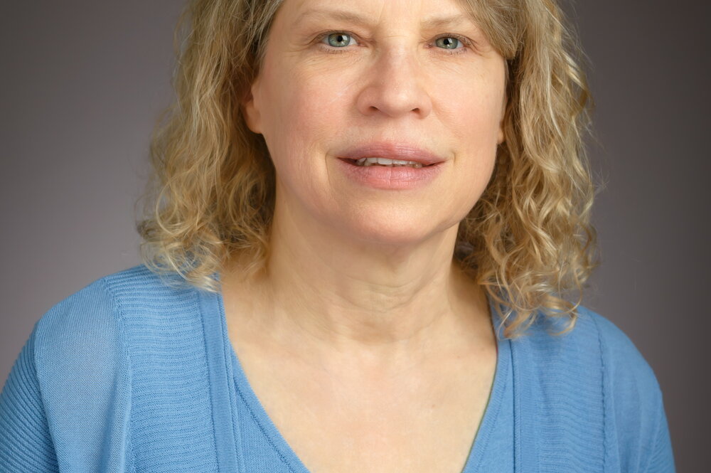 Woman in blue shirt