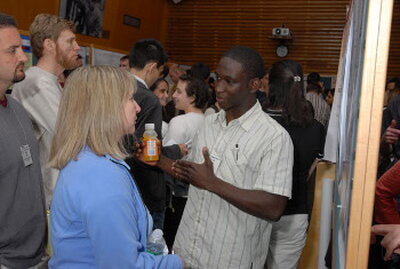 Tunji Toogun at a poster presentation.