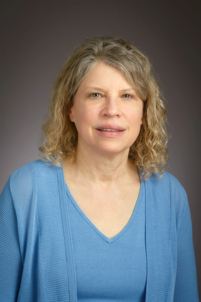 Woman in blue shirt